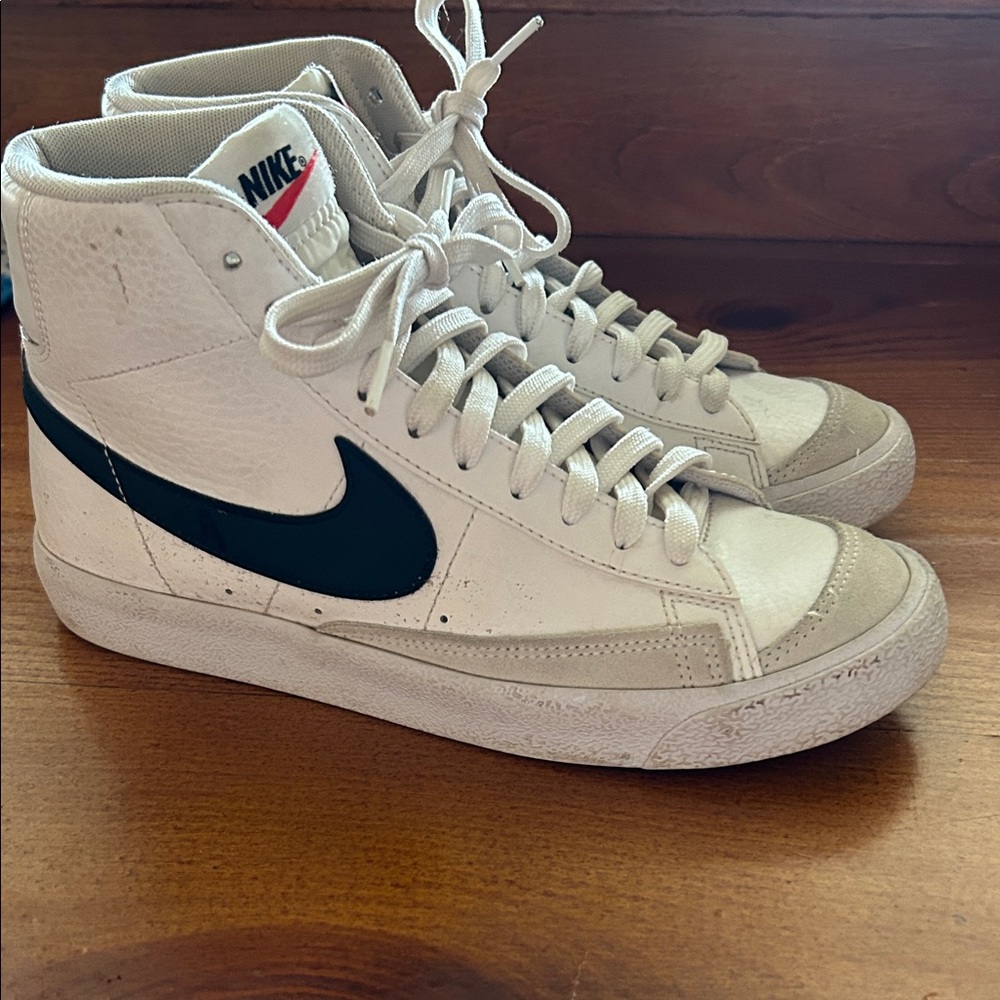 Nike Women’s White High-Top Sneakers with Black Swoosh and Red Tongue Accent